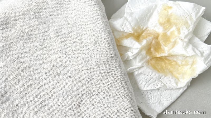 同块面料去除蜡渍后的干净效果,织物纹理清晰毫无印记